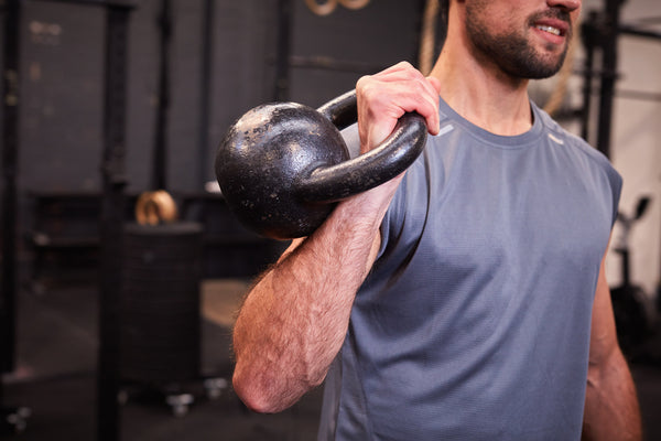 Man holding kettlebell