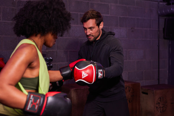 Woman boxing in gym